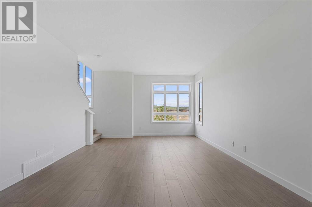 Single Family House for Sale in   Belmont Drive SW Belmont Calgary 