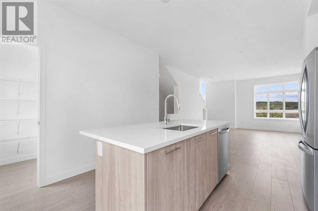 Single Family House for Sale in   Belmont Drive SW Belmont Calgary 