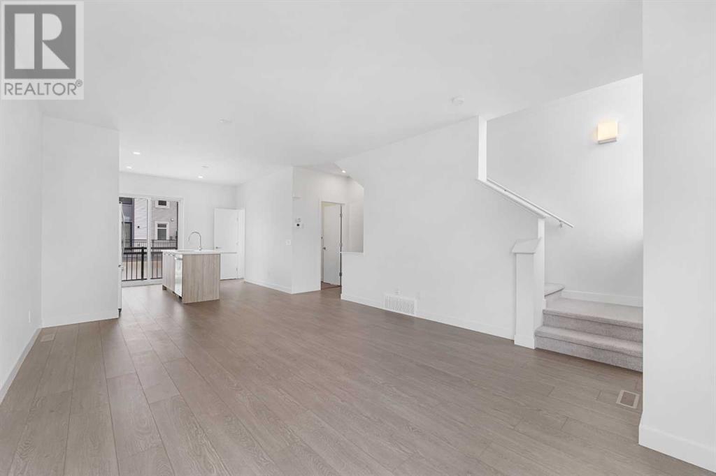 Single Family House for Sale in   Belmont Drive SW Belmont Calgary 