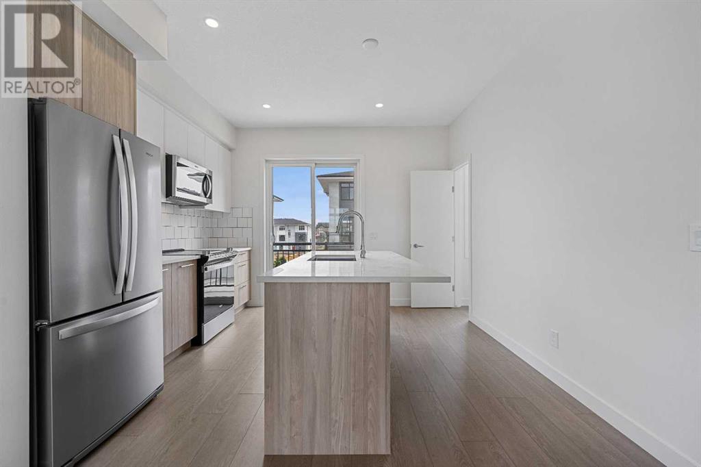 Single Family House for Sale in   Belmont Drive SW Belmont Calgary 