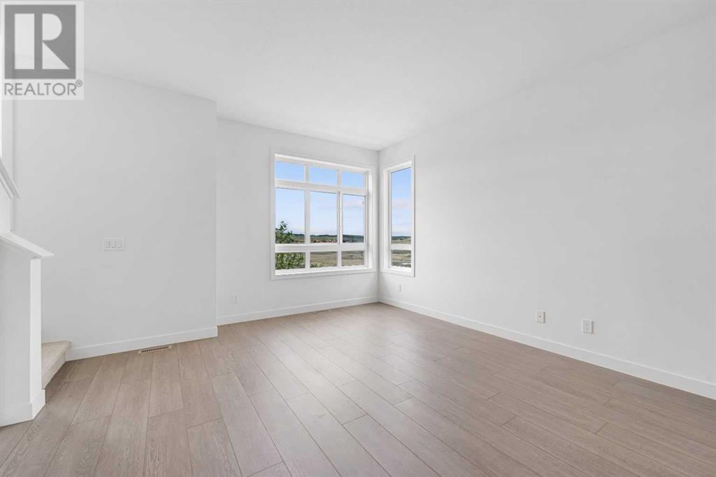 Single Family House for Sale in   Belmont Drive SW Belmont Calgary 
