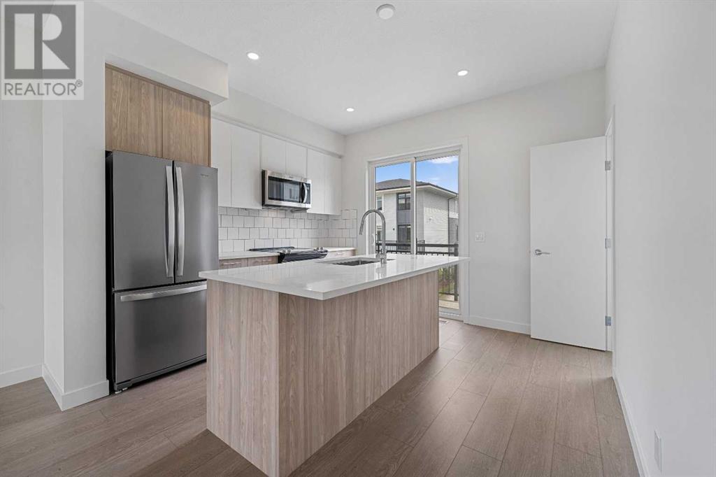 Single Family House for Sale in   Belmont Drive SW Belmont Calgary 