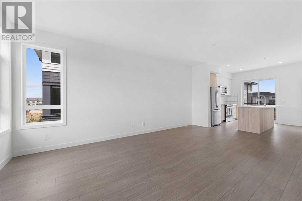 Single Family House for Sale in   Belmont Drive SW Belmont Calgary 