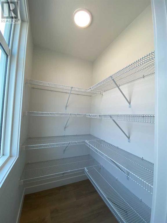 Single Family House for Sale in   Belmont Drive Belmont Calgary 