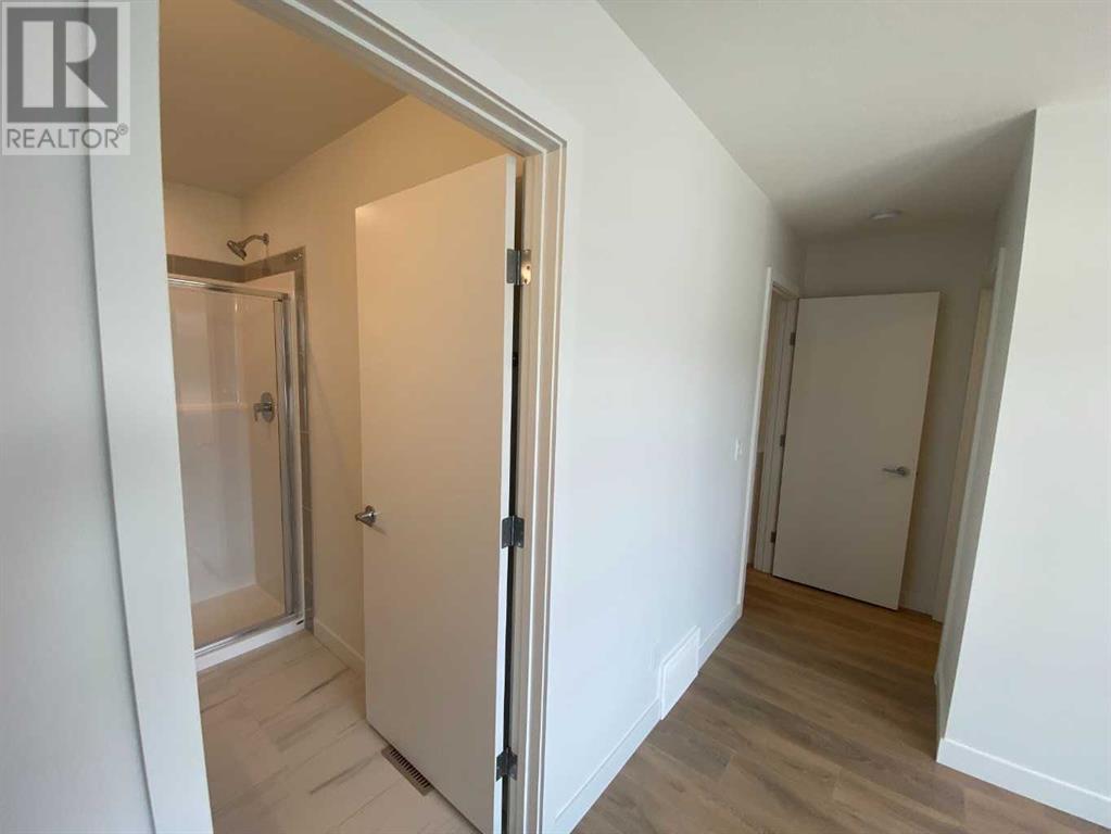 Single Family House for Sale in   Belmont Drive Belmont Calgary 