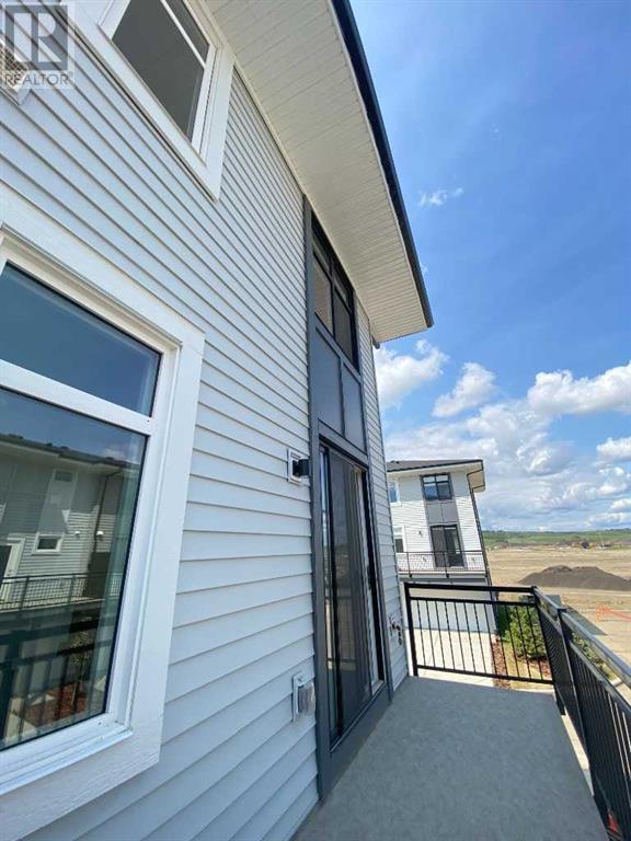 Single Family House for Sale in   Belmont Drive Belmont Calgary 