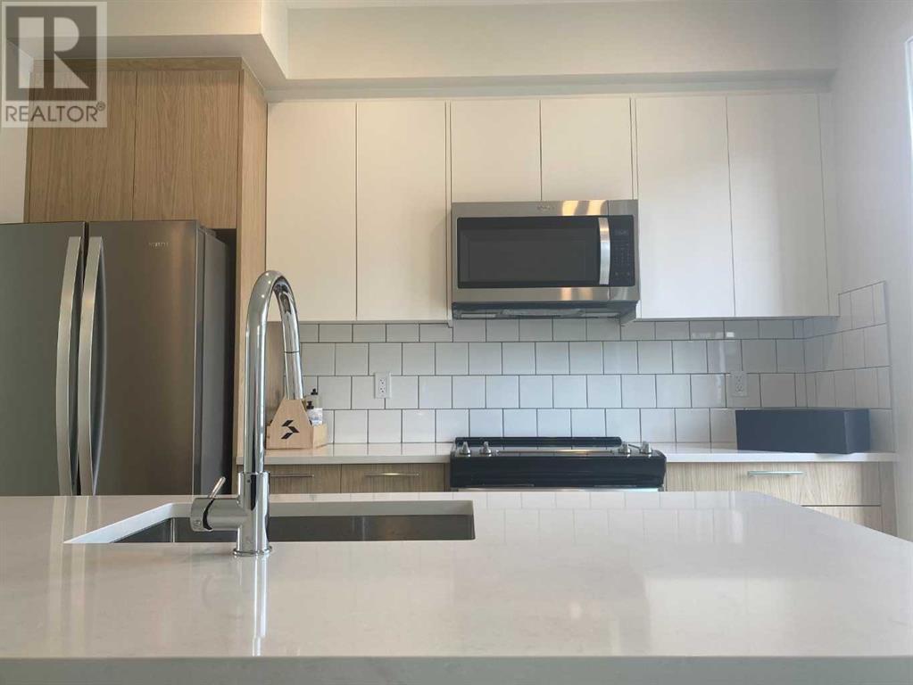 Single Family House for Sale in   Belmont Drive Belmont Calgary 