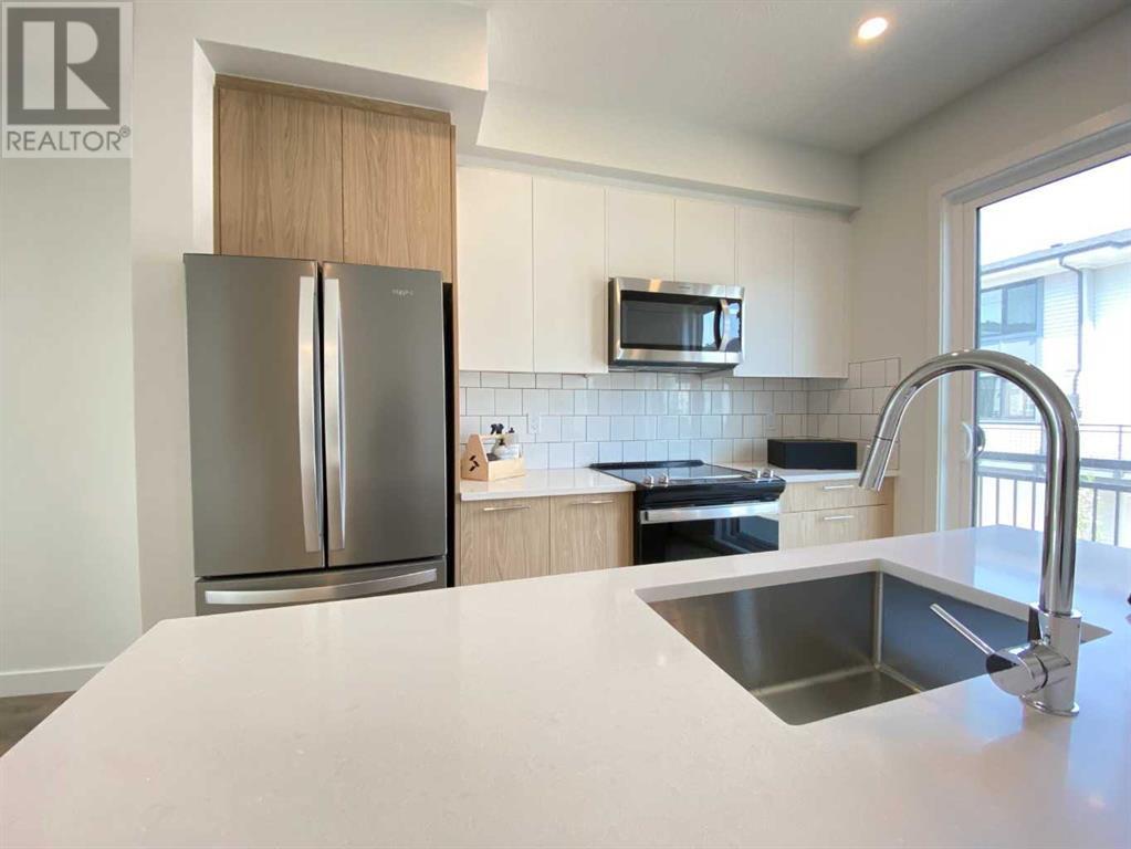 Single Family House for Sale in   Belmont Drive Belmont Calgary 