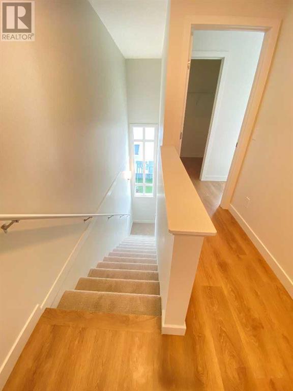Single Family House for Sale in   Belmont Drive Belmont Calgary 