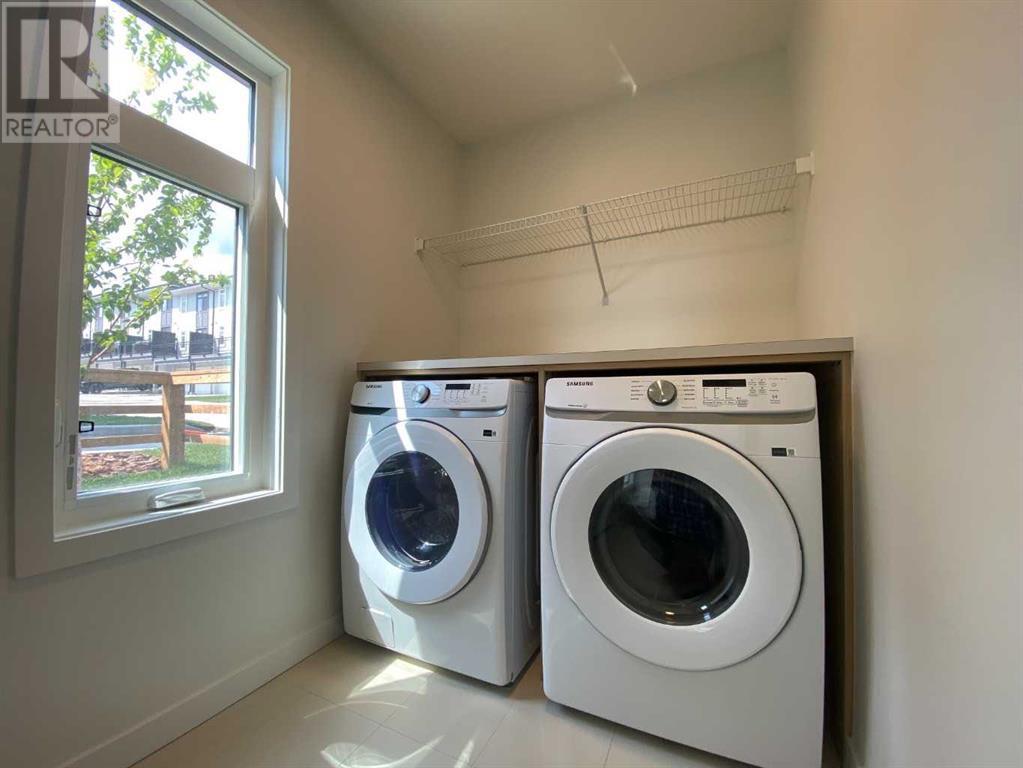 Single Family House for Sale in   Belmont Drive Belmont Calgary 