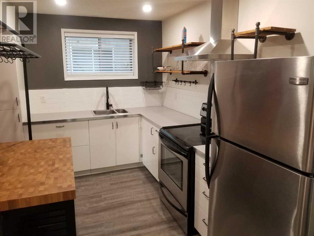 Single Family House Bi-level for Sale in   Avenue NW Bowness Calgary 