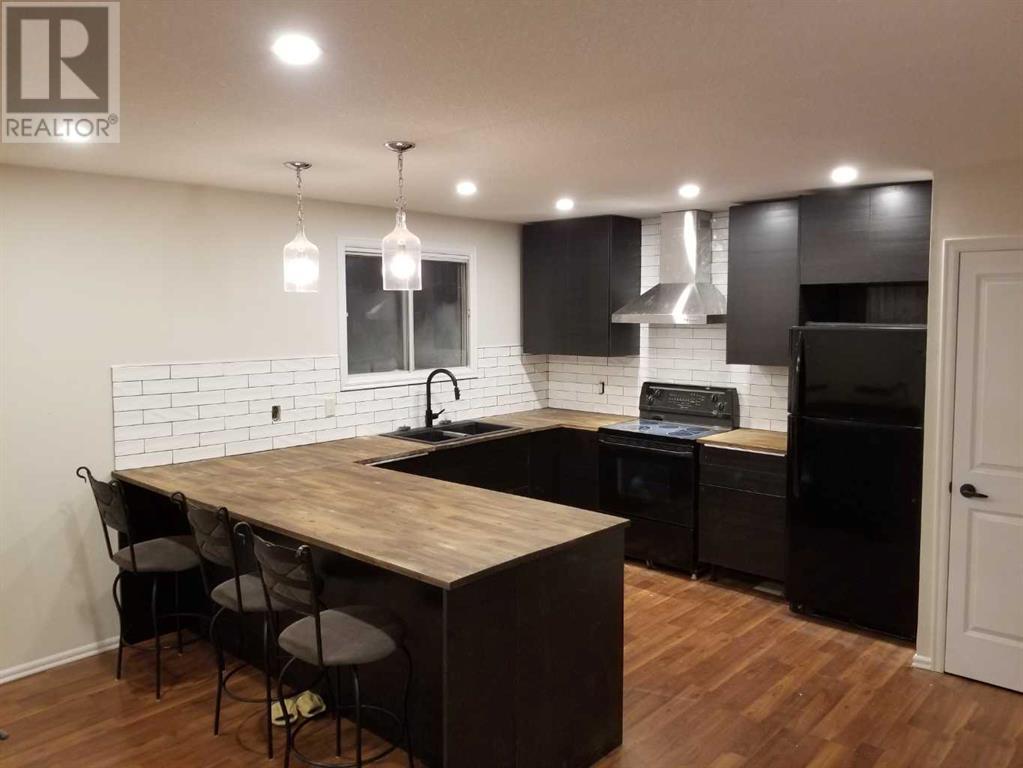 Single Family House Bi-level for Sale in   Avenue NW Bowness Calgary 