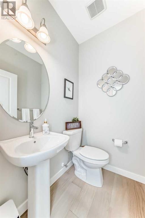 Single Family House for Sale in  Belmont Crescent SW Belmont Calgary 