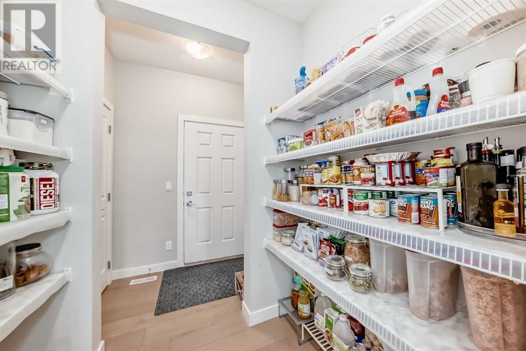 Single Family House for Sale in  Belmont Crescent SW Belmont Calgary 
