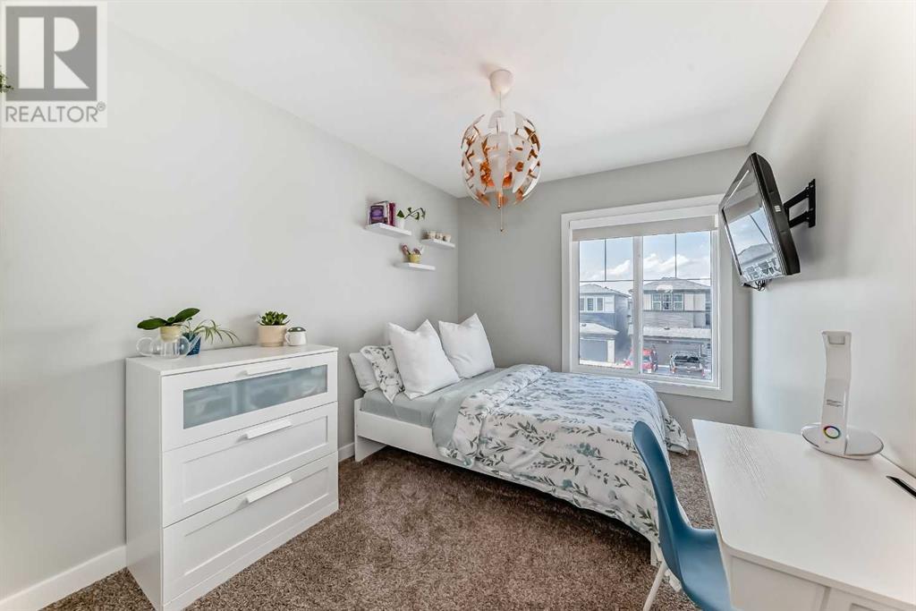 Single Family House for Sale in  Belmont Crescent SW Belmont Calgary 