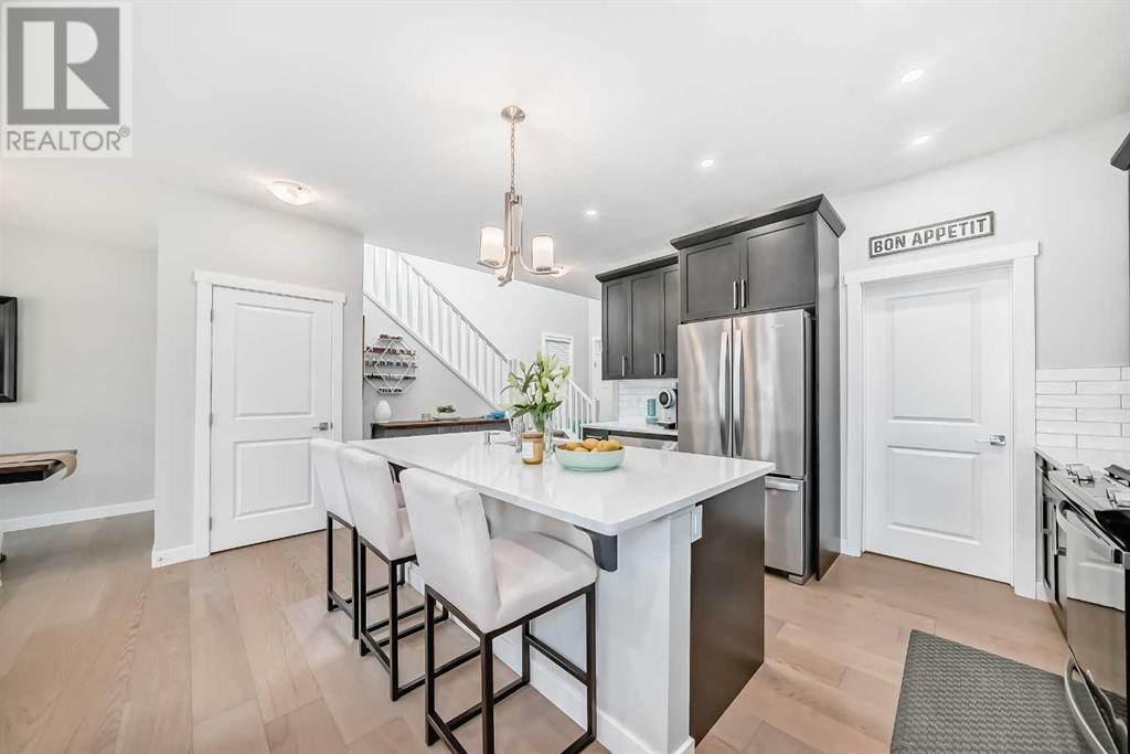 Single Family House for Sale in  Belmont Crescent SW Belmont Calgary 