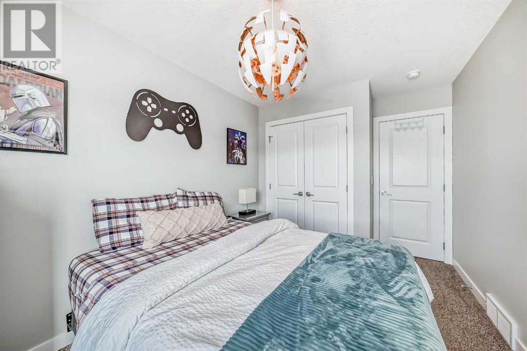Single Family House for Sale in  Belmont Crescent SW Belmont Calgary 