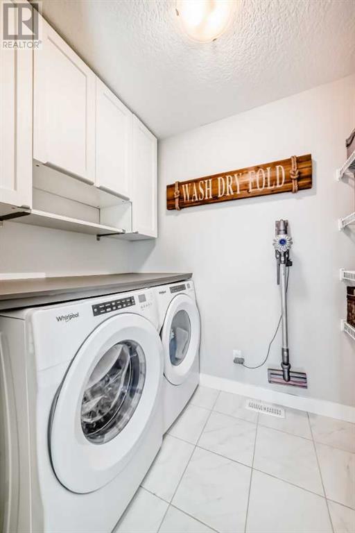 Single Family House for Sale in  Belmont Crescent SW Belmont Calgary 