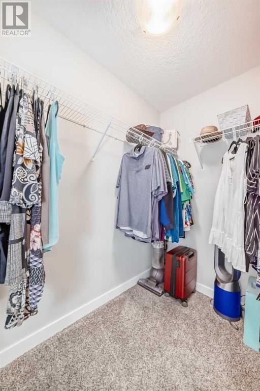 Single Family House for Sale in  Belmont Crescent SW Belmont Calgary 