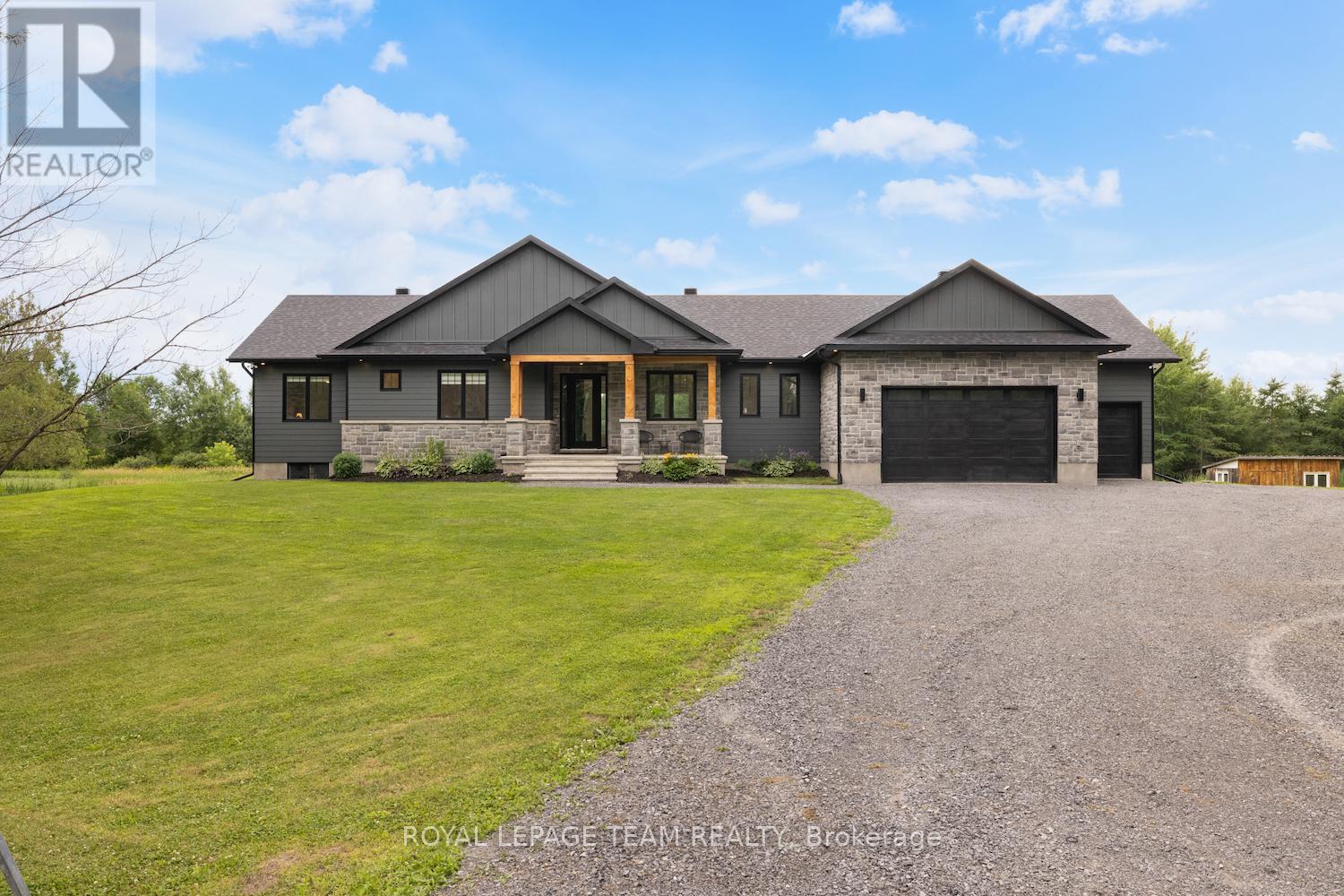 3rd bay also has garage door to rear yard