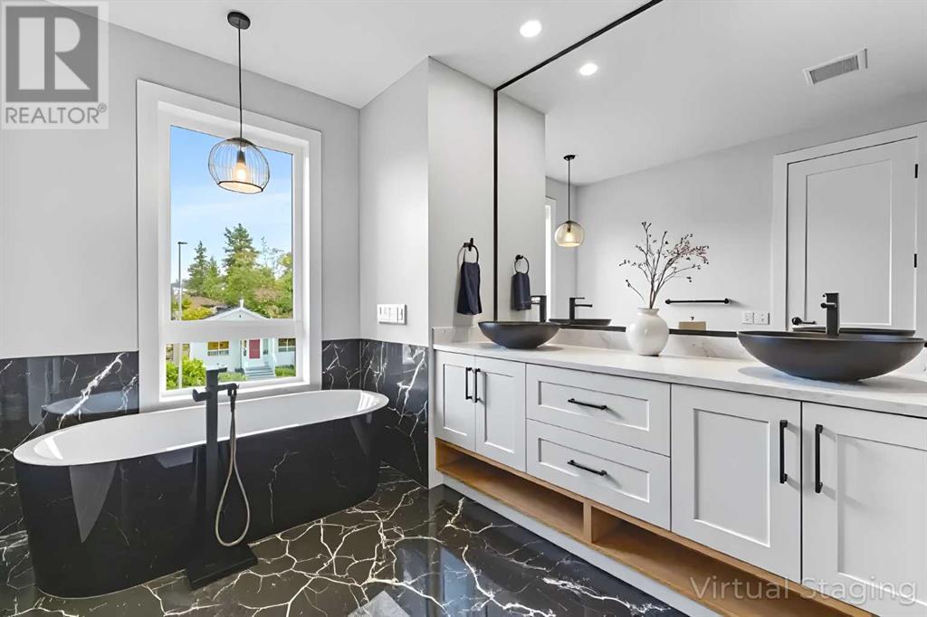 Multi-family House for Sale in  &   Avenue NW Capitol Hill Calgary 