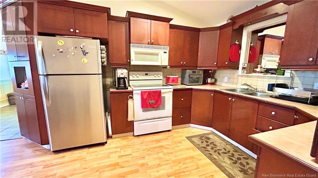 Photo 9 of 896 Des Acadiens Boulevard Unit 1 2, Bertrand NB