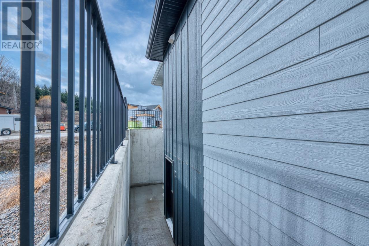 Photo 10 of 937 Bull Crescent, Kelowna BC