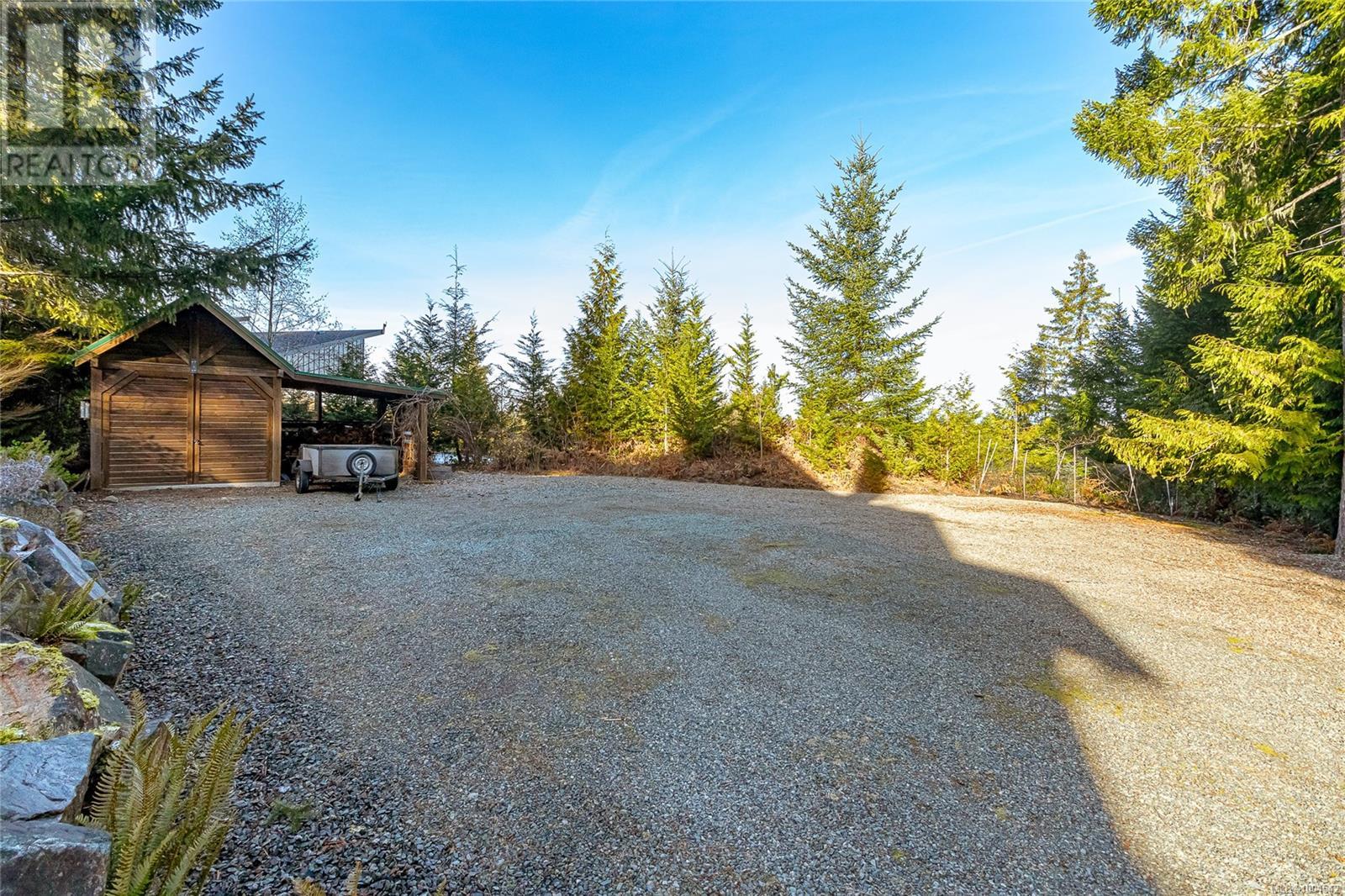 Photo 24 of 1556 Meadowood Way, Qualicum Beach BC