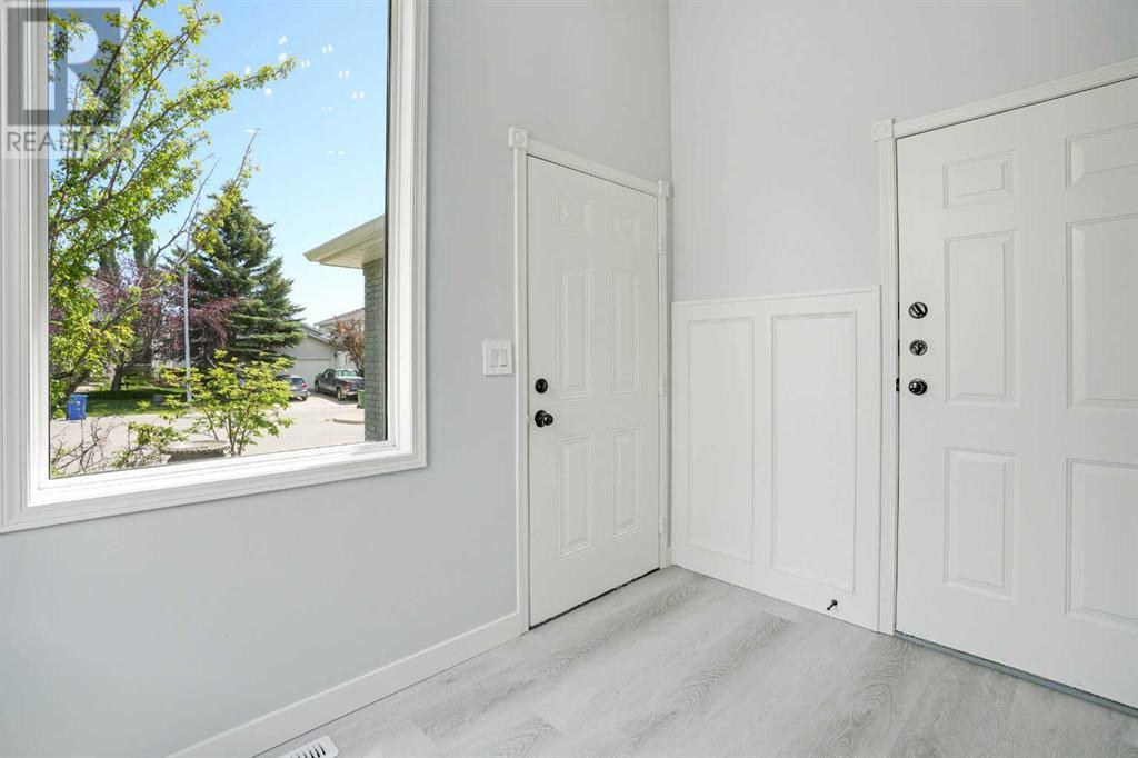 Single Family House Bi-level for Sale in  Scanlon Place NW Scenic Acres Calgary 