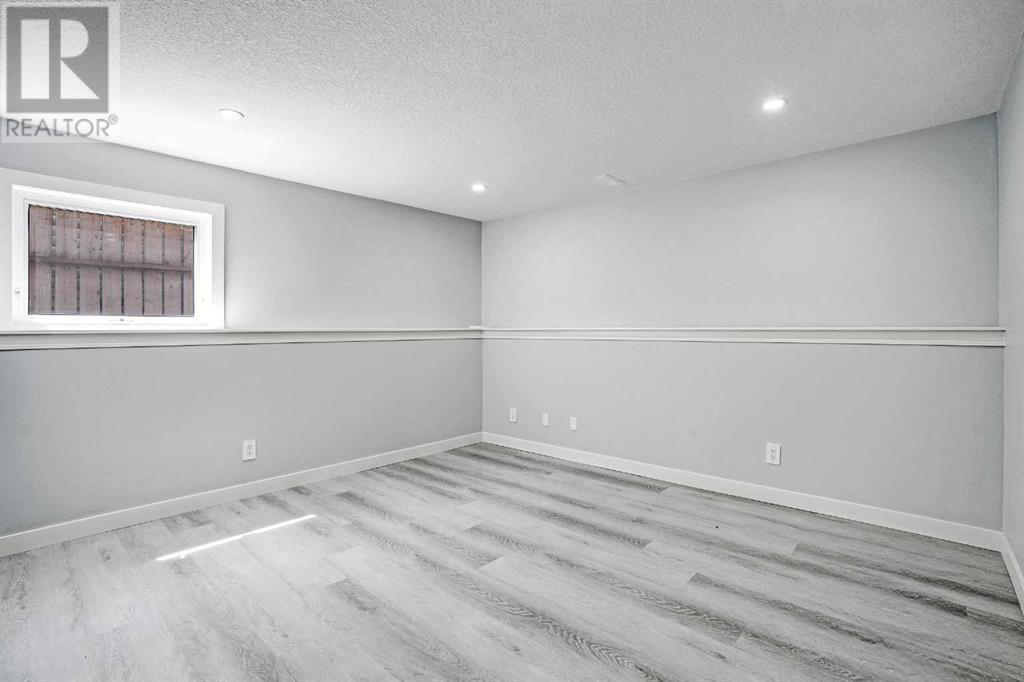 Single Family House Bi-level for Sale in  Scanlon Place NW Scenic Acres Calgary 