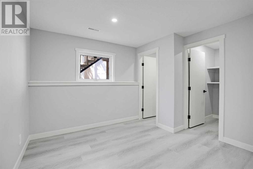 Single Family House Bi-level for Sale in  Scanlon Place NW Scenic Acres Calgary 