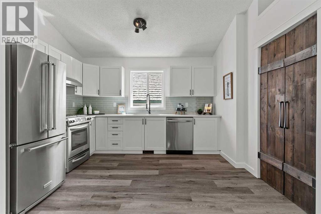 Single Family House Bi-level for Sale in  Mt Aberdeen Close SE McKenzie Lake Calgary 