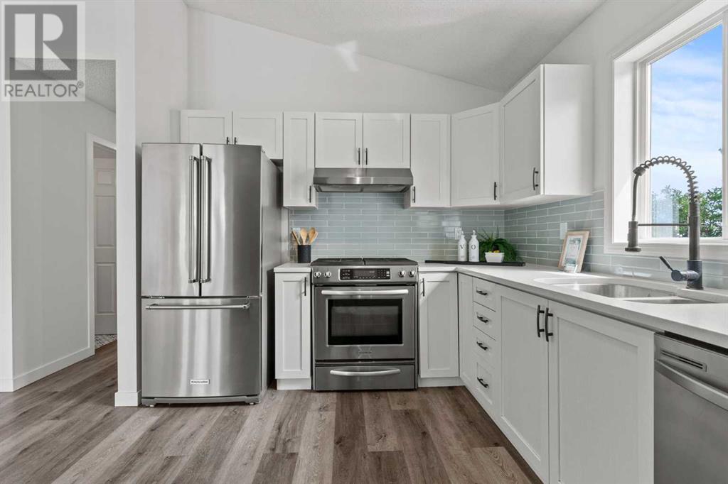 Single Family House Bi-level for Sale in  Mt Aberdeen Close SE McKenzie Lake Calgary 