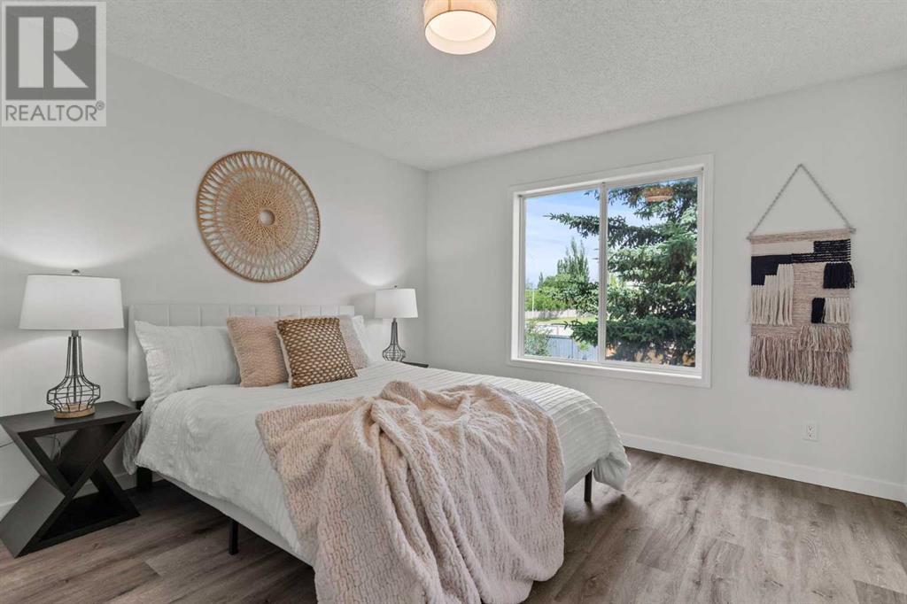 Single Family House Bi-level for Sale in  Mt Aberdeen Close SE McKenzie Lake Calgary 