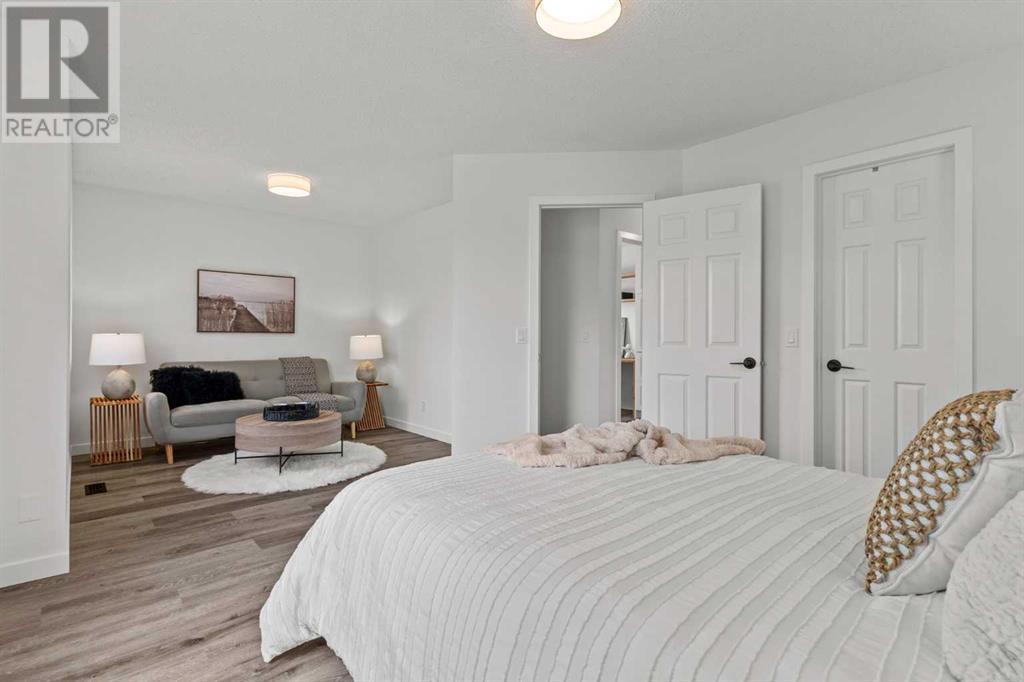 Single Family House Bi-level for Sale in  Mt Aberdeen Close SE McKenzie Lake Calgary 