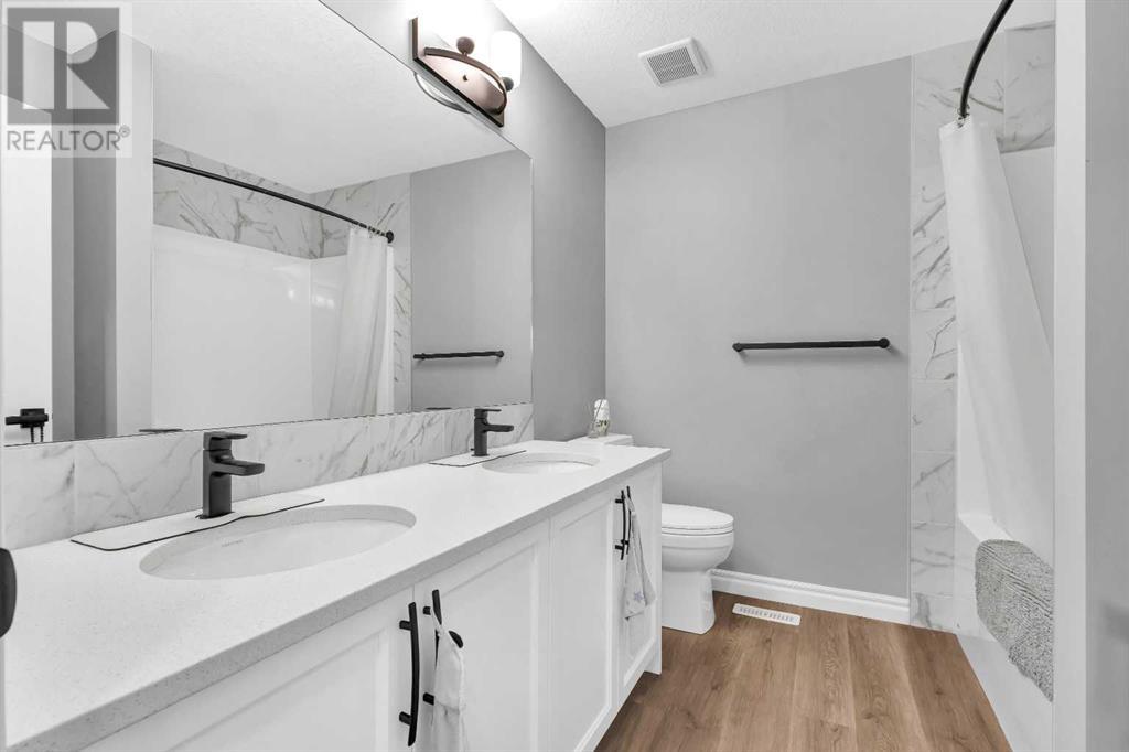 Single Family House for Sale in  Ambleside Crescent NW Moraine Calgary 