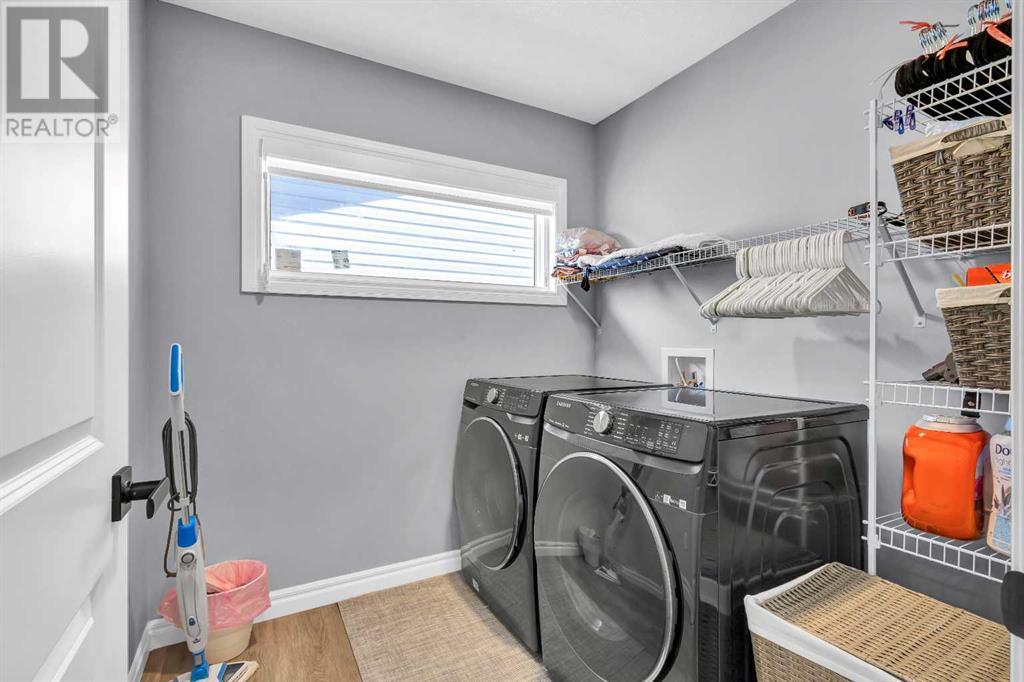 Single Family House for Sale in  Ambleside Crescent NW Moraine Calgary 