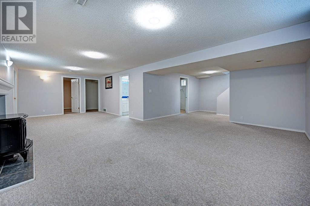 Single Family House Bungalow for Sale in  Cantabrian Drive SW Canyon Meadows Calgary 