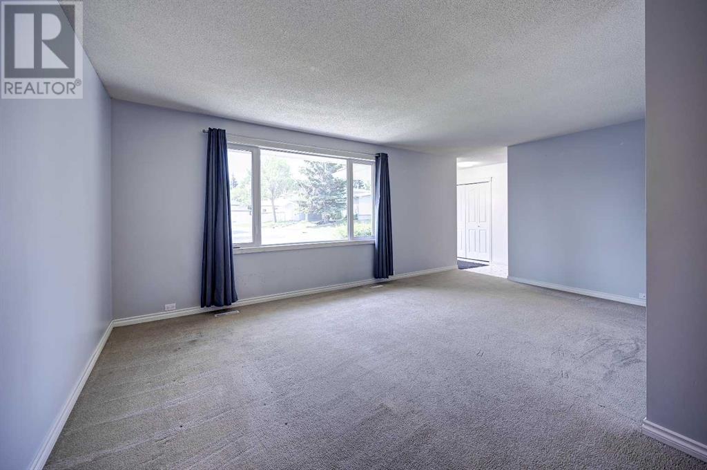 Single Family House Bungalow for Sale in  Cantabrian Drive SW Canyon Meadows Calgary 