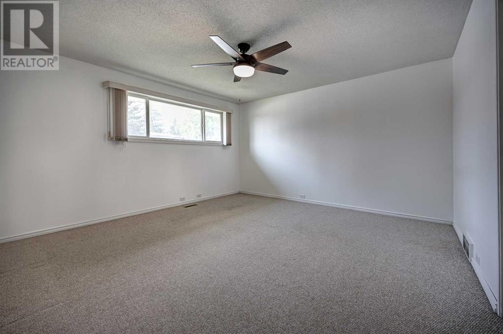 Single Family House Bungalow for Sale in  Cantabrian Drive SW Canyon Meadows Calgary 