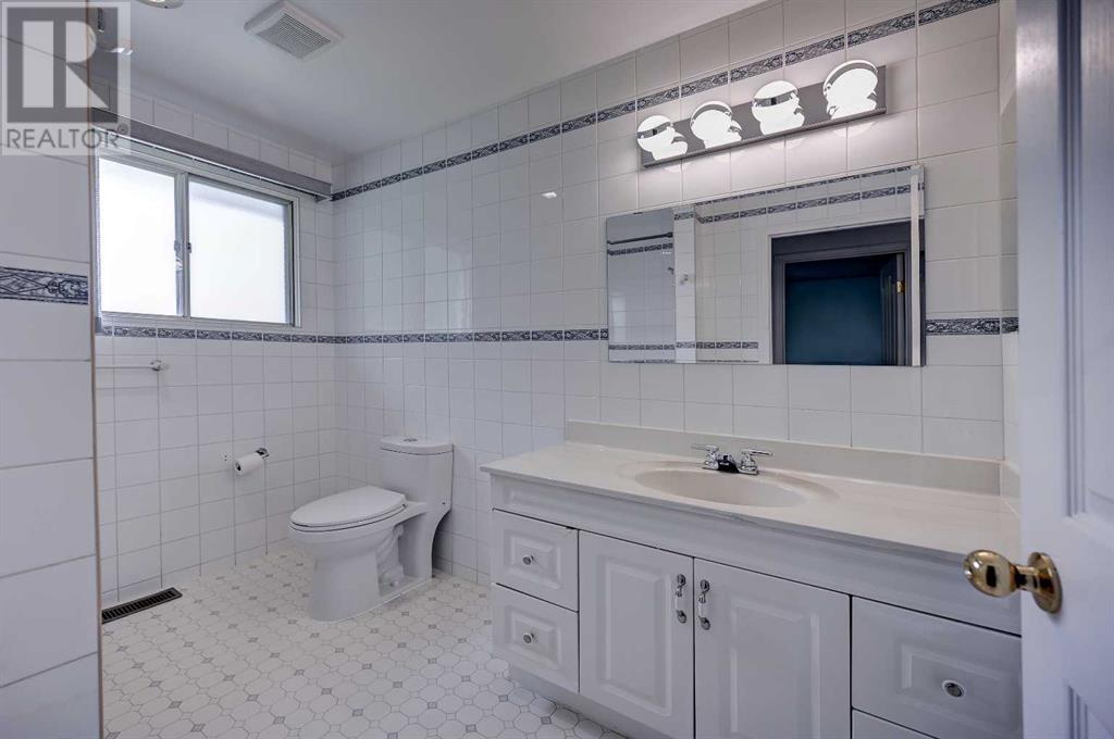 Single Family House Bungalow for Sale in  Cantabrian Drive SW Canyon Meadows Calgary 