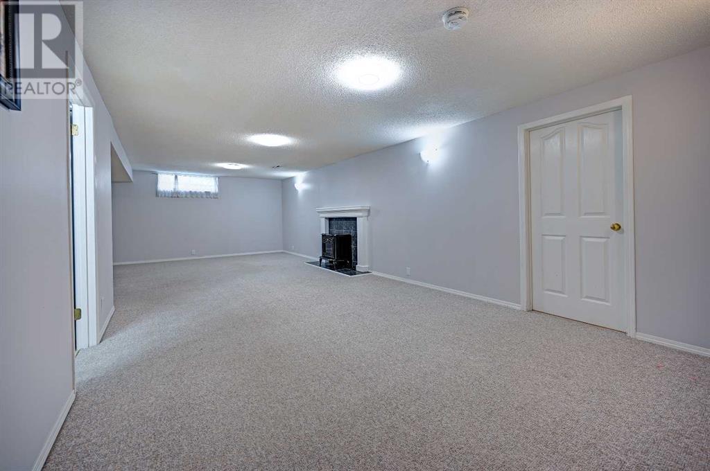Single Family House Bungalow for Sale in  Cantabrian Drive SW Canyon Meadows Calgary 