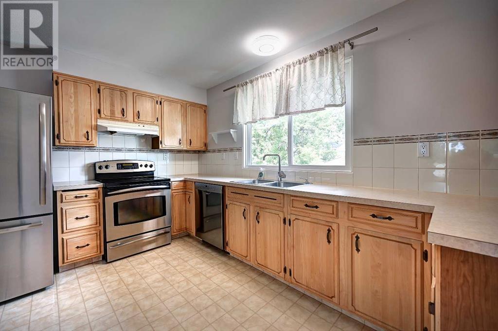 Single Family House Bungalow for Sale in  Cantabrian Drive SW Canyon Meadows Calgary 