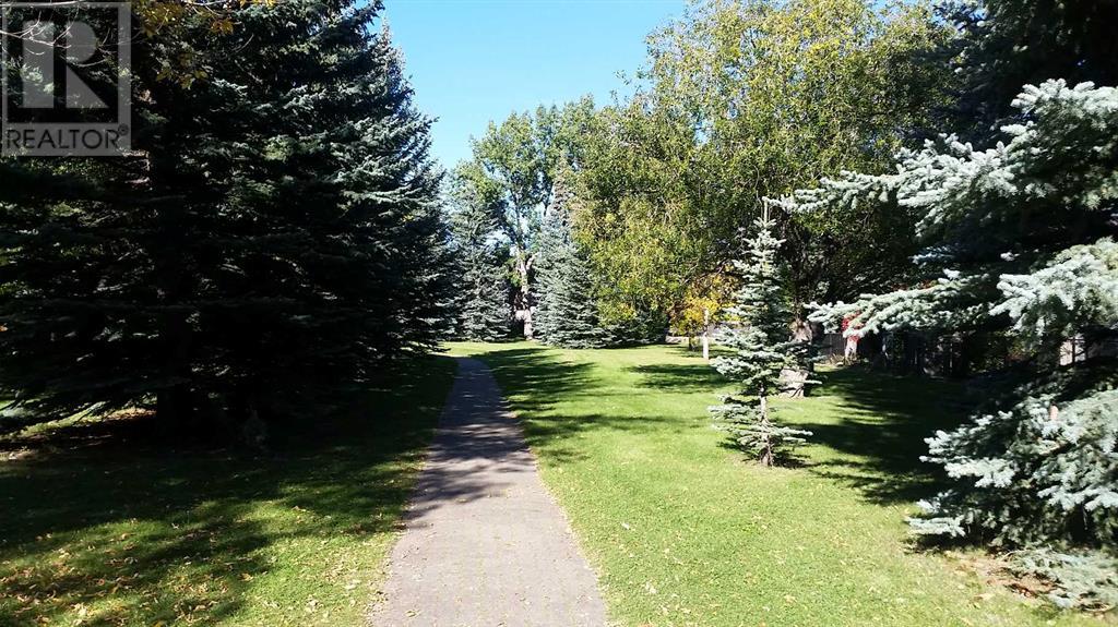 Single Family House Bungalow for Sale in  Cantabrian Drive SW Canyon Meadows Calgary 