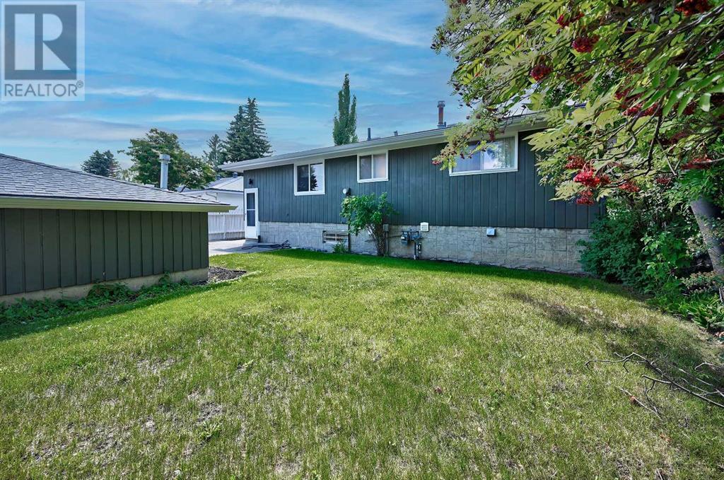 Single Family House Bungalow for Sale in  Cantabrian Drive SW Canyon Meadows Calgary 
