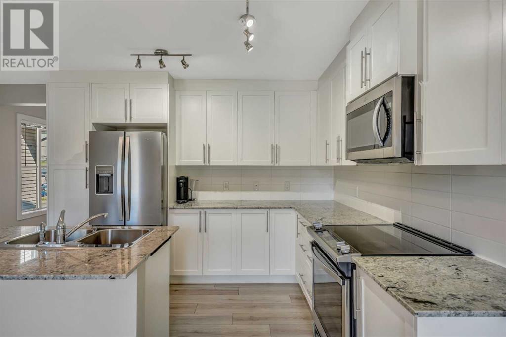Single Family House 4 Level for Sale in  Sage Hill Grove NW Sage Hill Calgary 