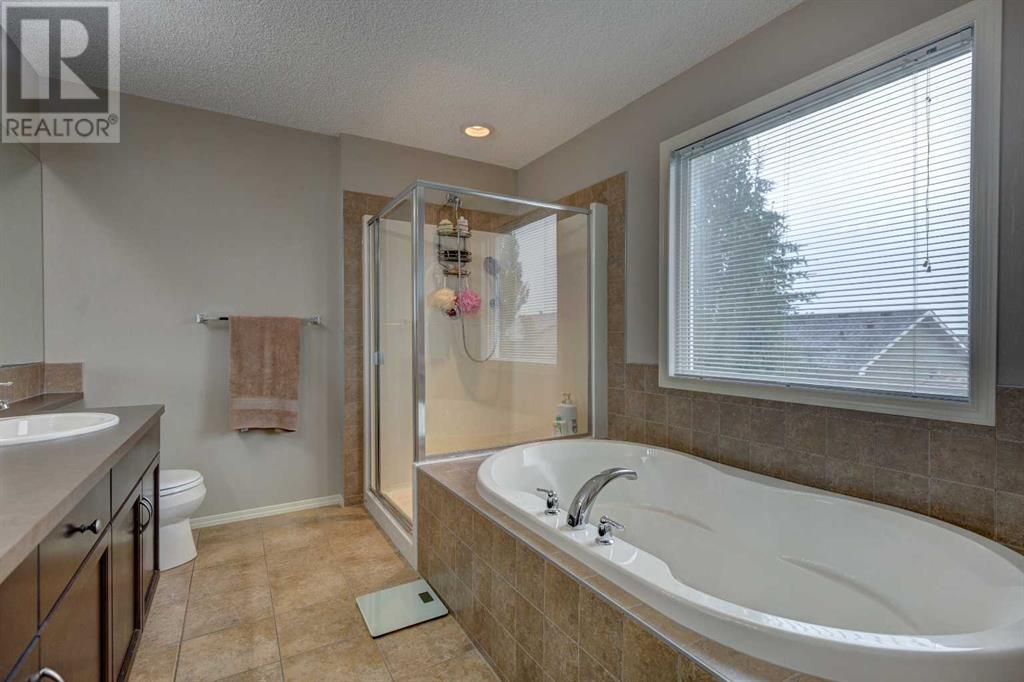 Single Family House for Sale in  Everbrook Way SW Evergreen Calgary 