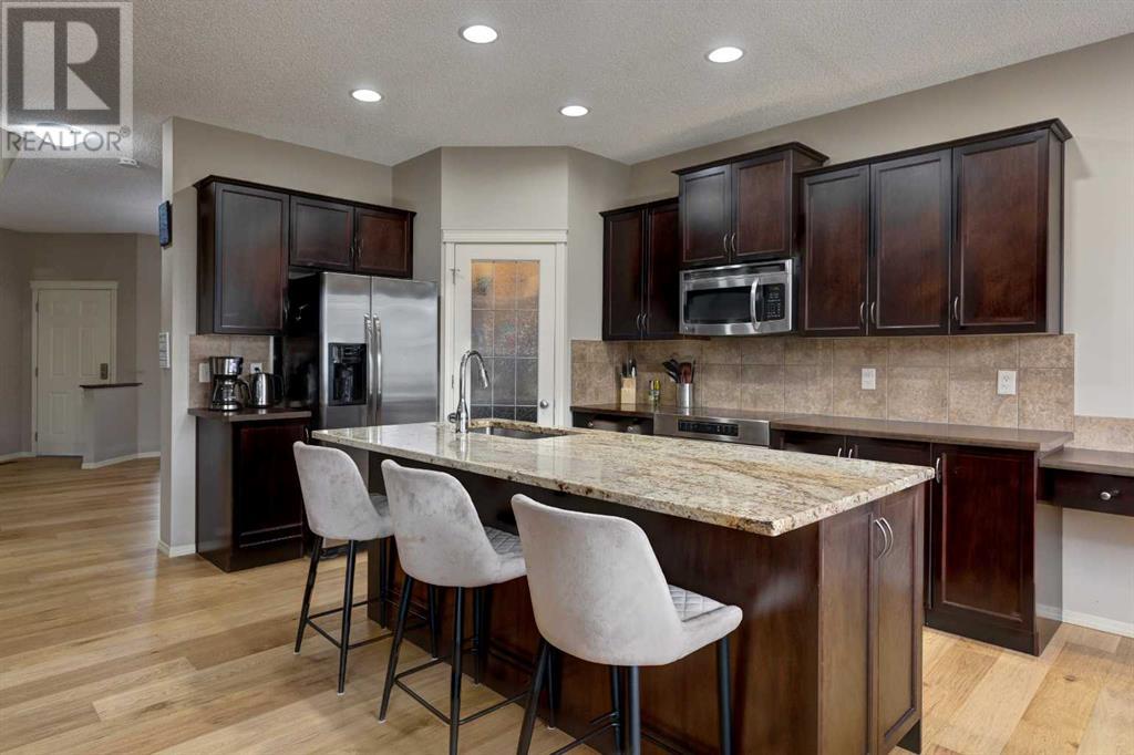 Single Family House for Sale in  Everbrook Way SW Evergreen Calgary 