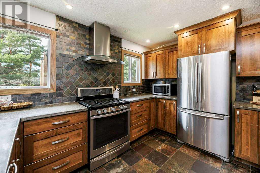 Single Family House Bi-level for Sale in  A Avenue Mountview Red Deer 