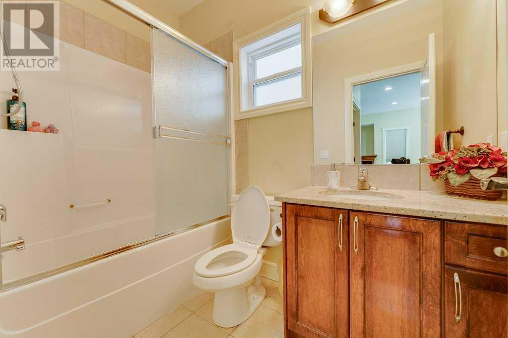 Single Family House Bi-level for Sale in  Taralake Way NE Taradale Calgary 